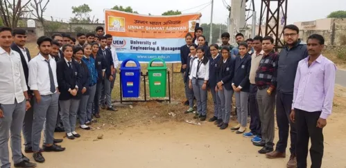 Distribution of dustbins by the students of UEM Jaipur under Unnat Bharat Abhiyan