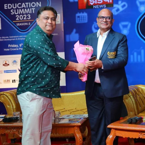Prof. Dr. Pradeep Kumar Sharma, Registrar, University of Engineering & Management (UEM), JAIPUR being felicitated by Mr. Vishal Mathur, Vice-President, First India News TV channel, in their educational program on 9th June, 2023.