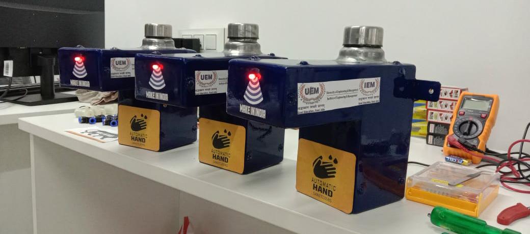 Automatic sanitizer spraying machine developed by Akash Dubey and Afaq Ahmed, alumni members of UEM Jaipur